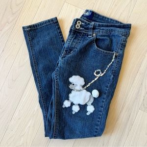 Angel Jeans with a White Poodle
